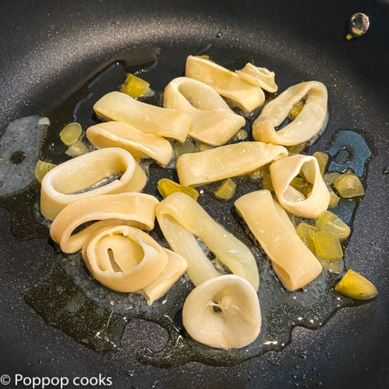 calamari and garlic in the skillet